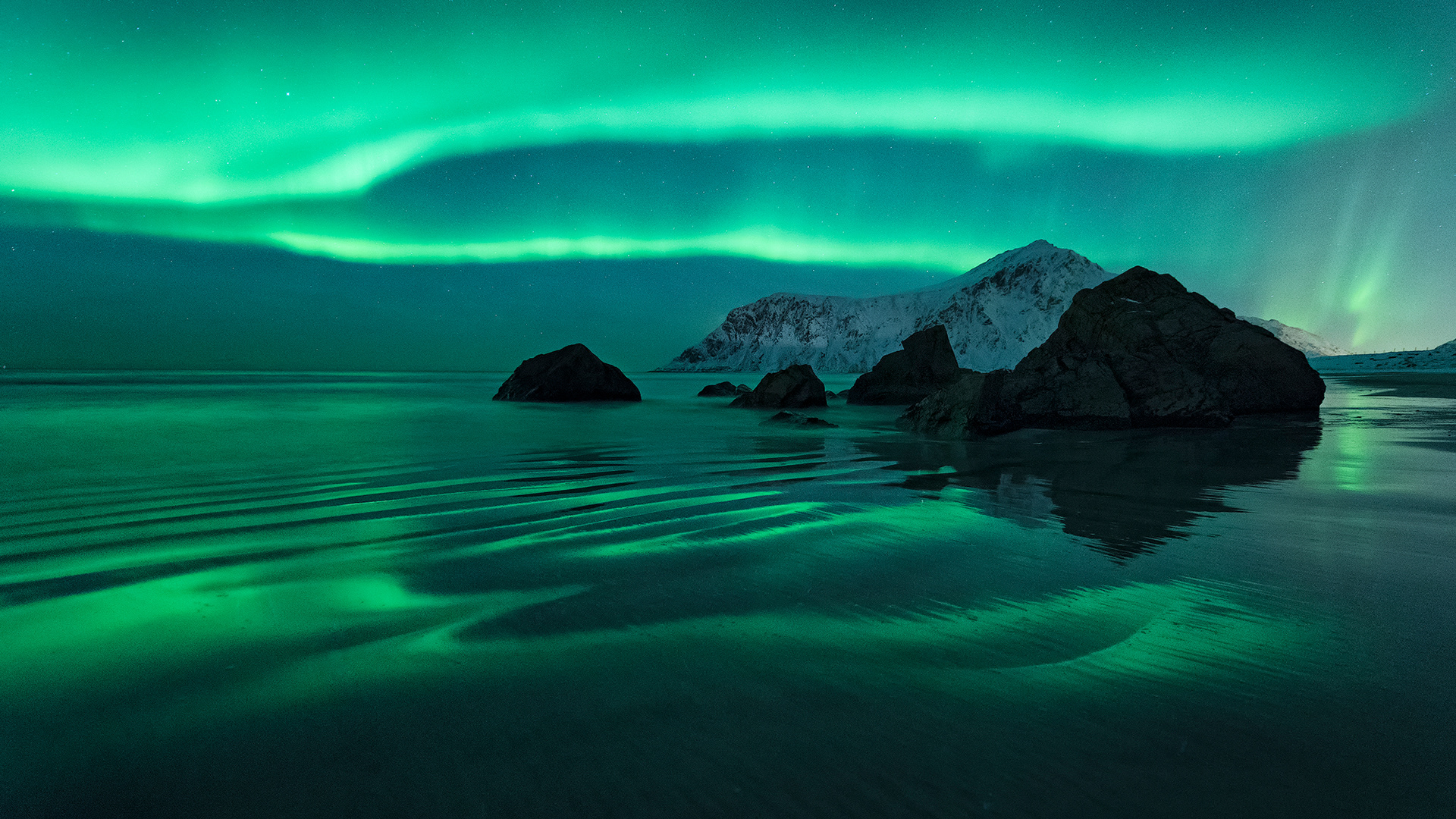 Aurora over ocean waters